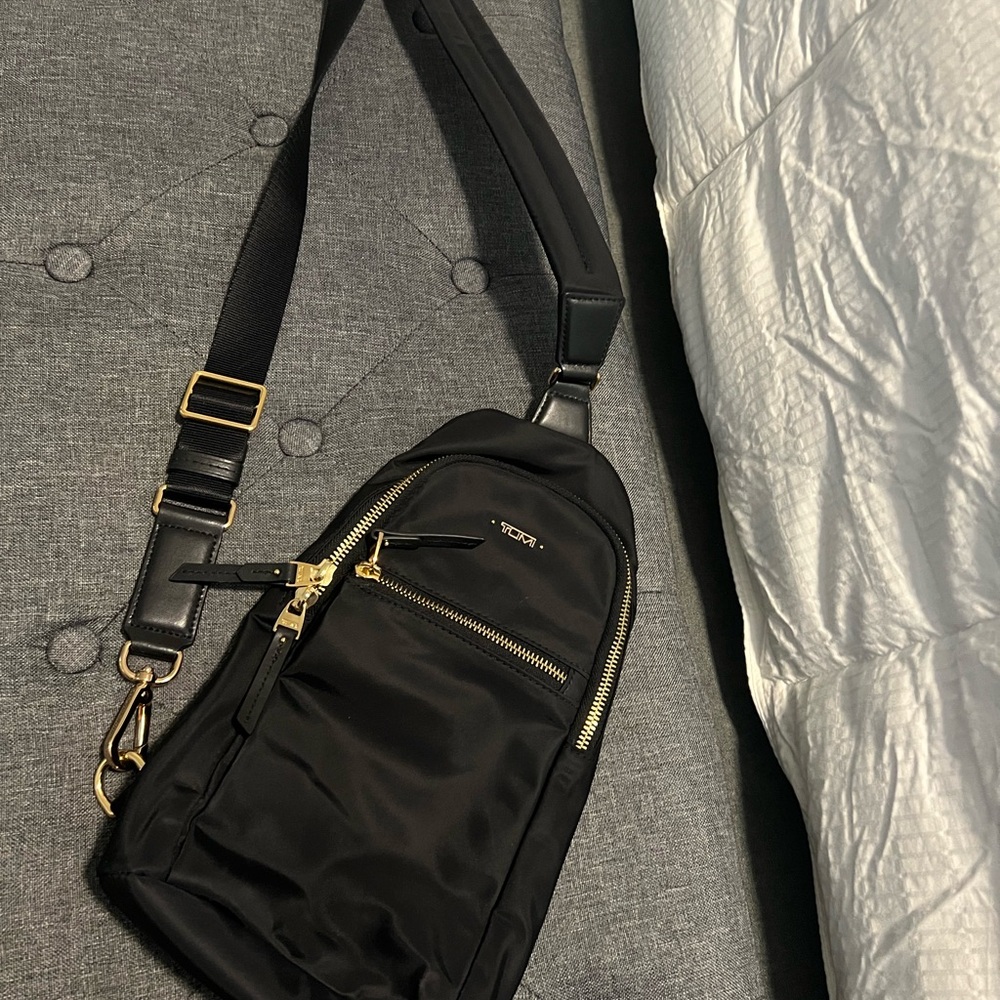 Tumi Black and Gold Crossbody Bag with Adjustable Strap